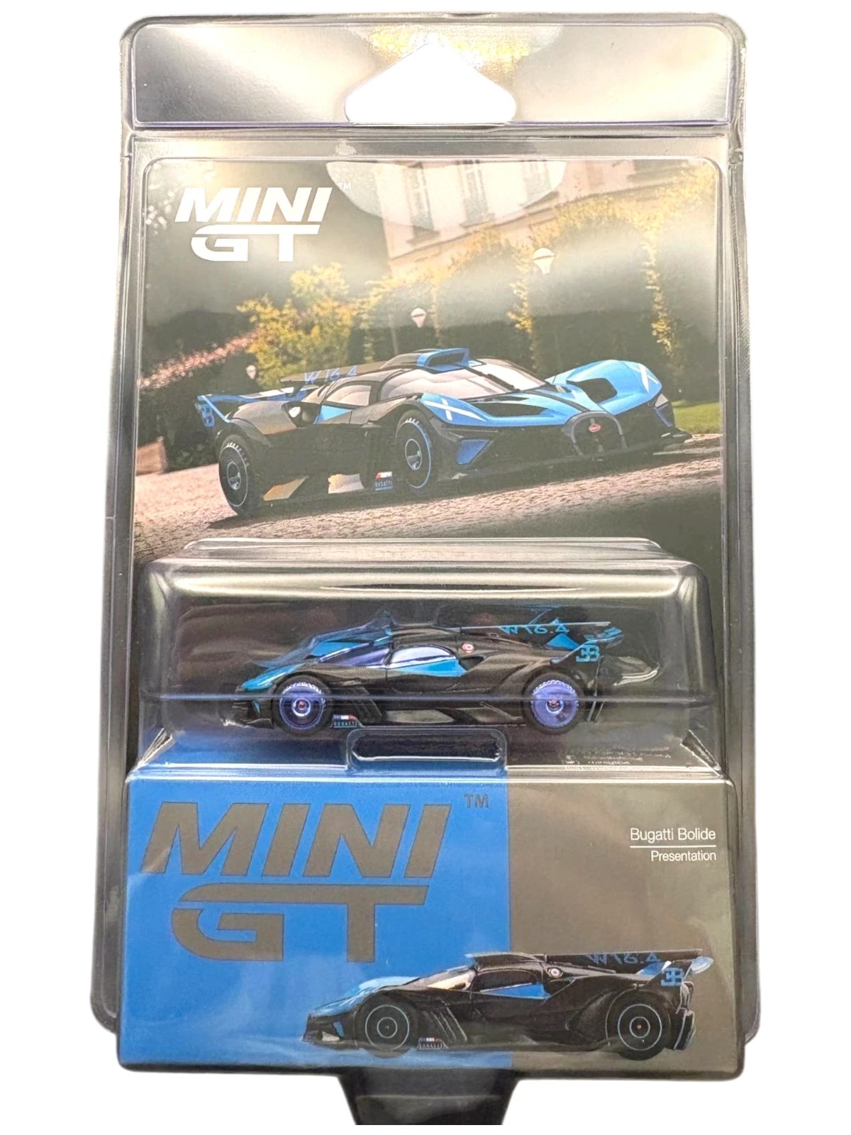 More Than Diecast Mini GT Bugatti Bolide Chase #1063 in black and blue packaging with hypercar model visible