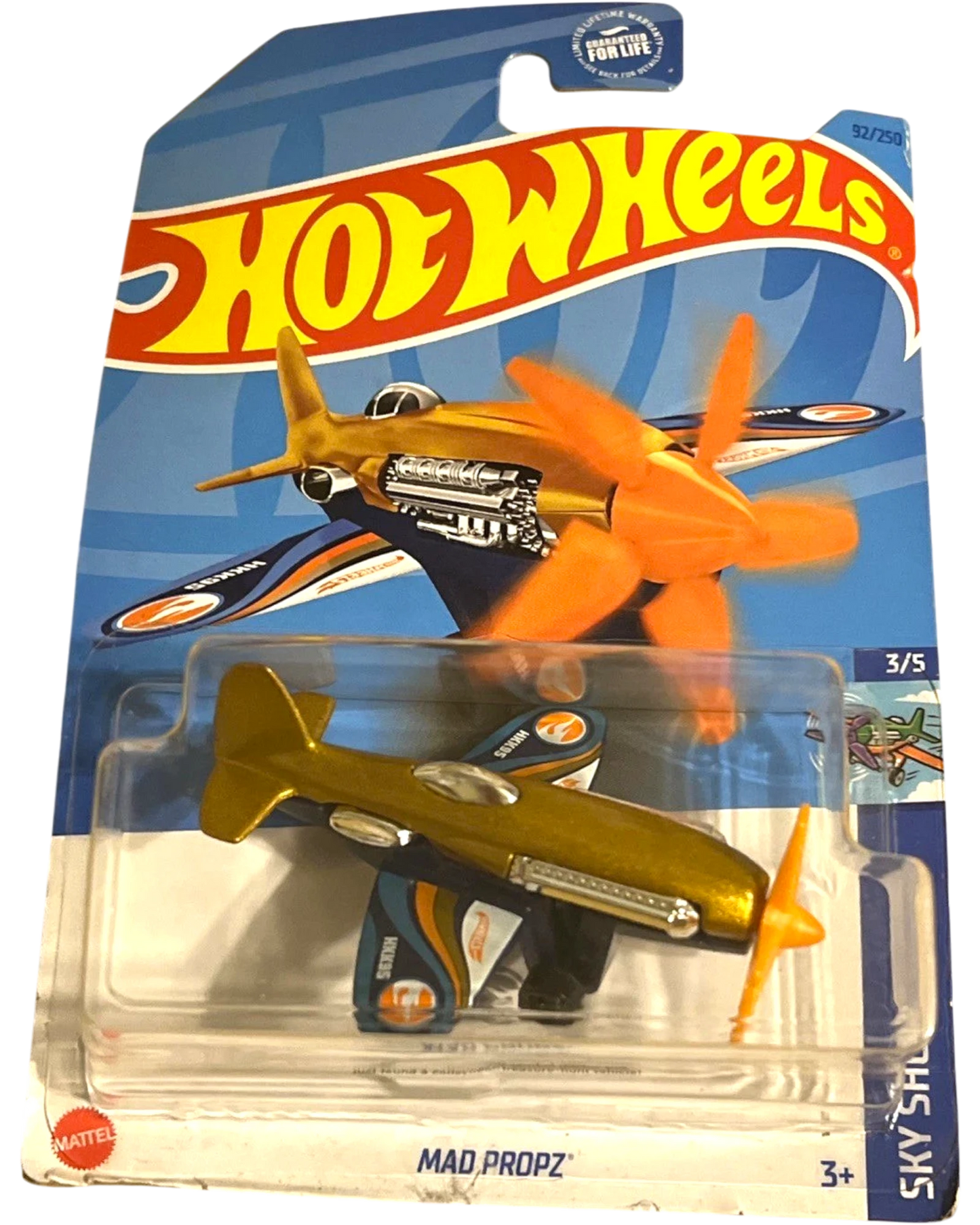 More Than Diecast 2023 Hot Wheels Mad Propz Treasure Hunt gold toy airplane with orange propeller on blister card