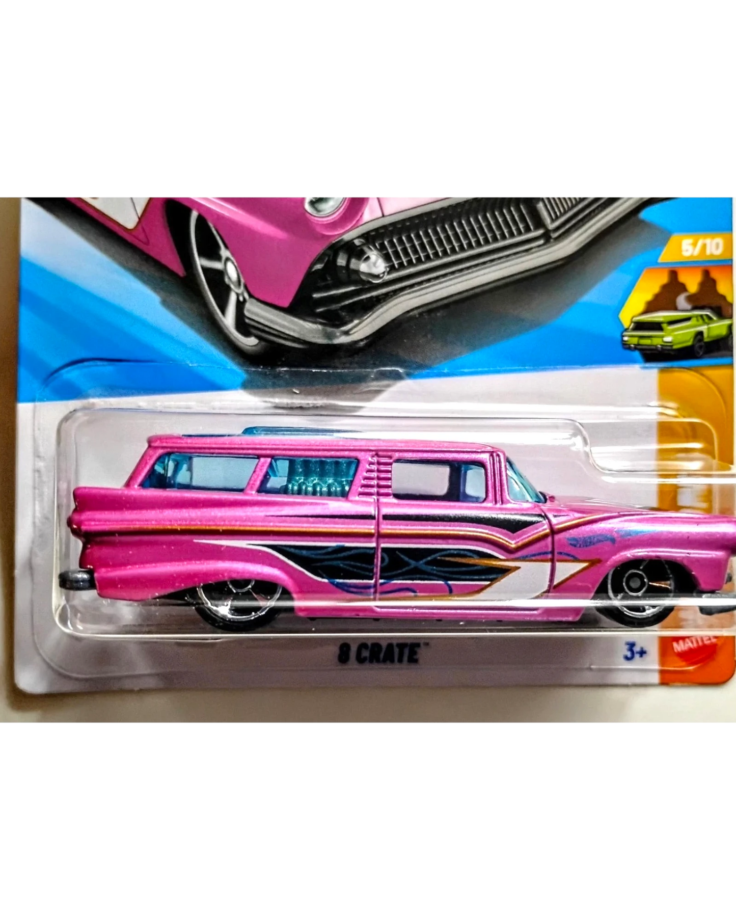 More Than Diecast 2026 Hot Wheels 8 Crate wagon in pink with blue tinted windows and flame graphics.