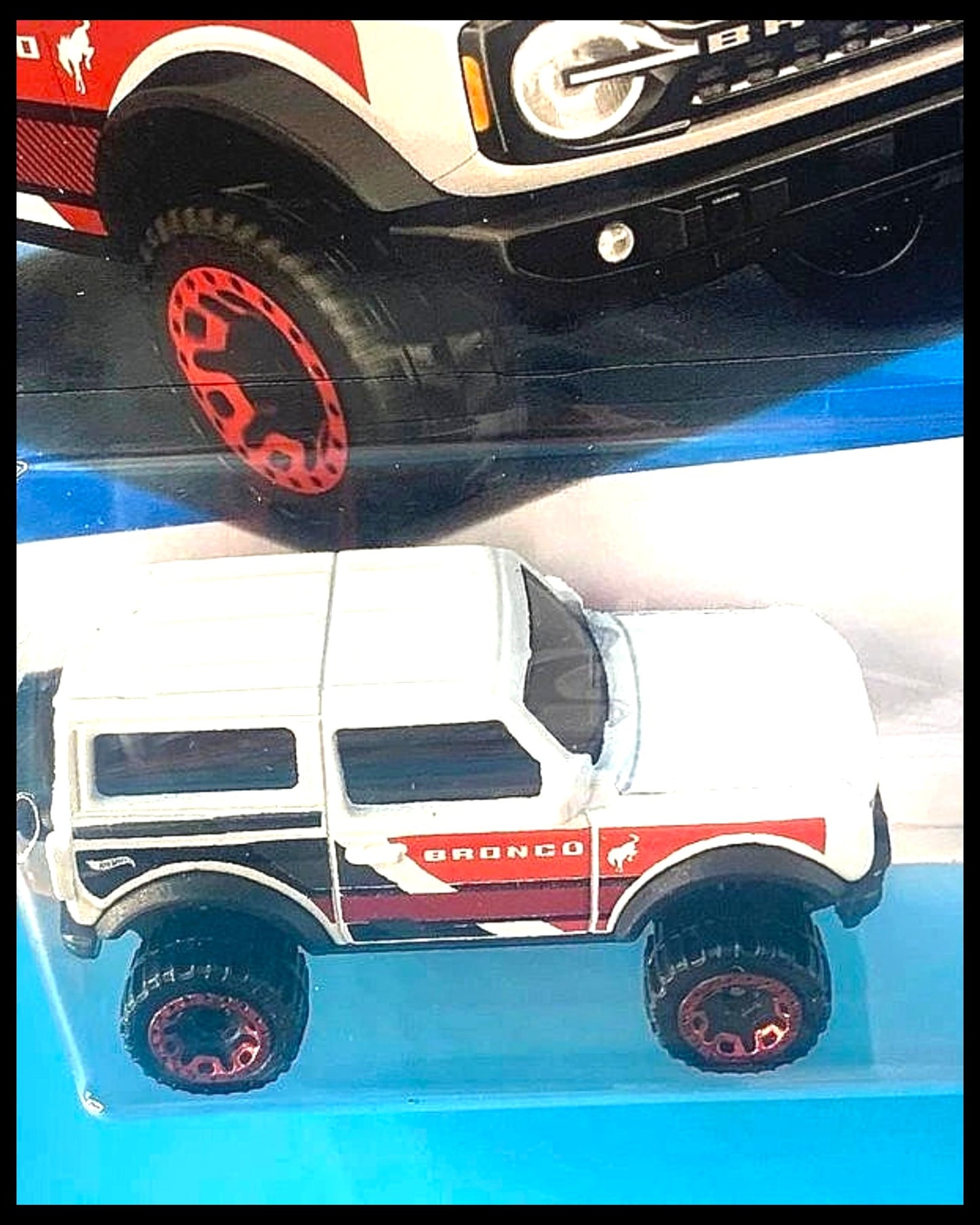 More Than Diecast Hot Wheels 2021 Ford Bronco in white with red and black side graphics in original blister packaging
