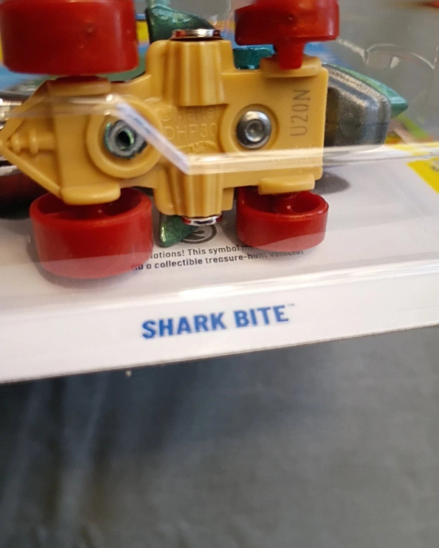 More Than Diecast Hot Wheels Shark Bite Treasure Hunt die-cast car in original packaging with red wheels