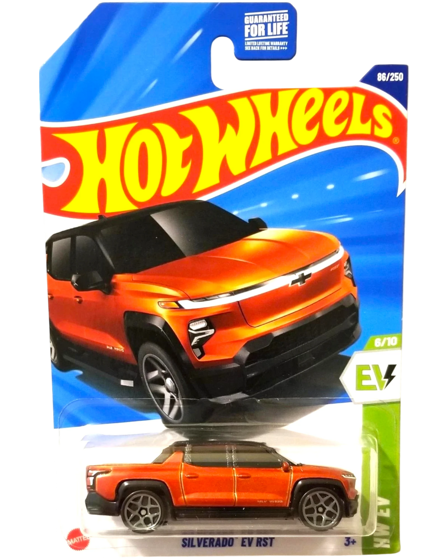 More Than Diecast Hot Wheels 2025 Silverado EV RST pickup truck, orange with black accents, in blister pack.