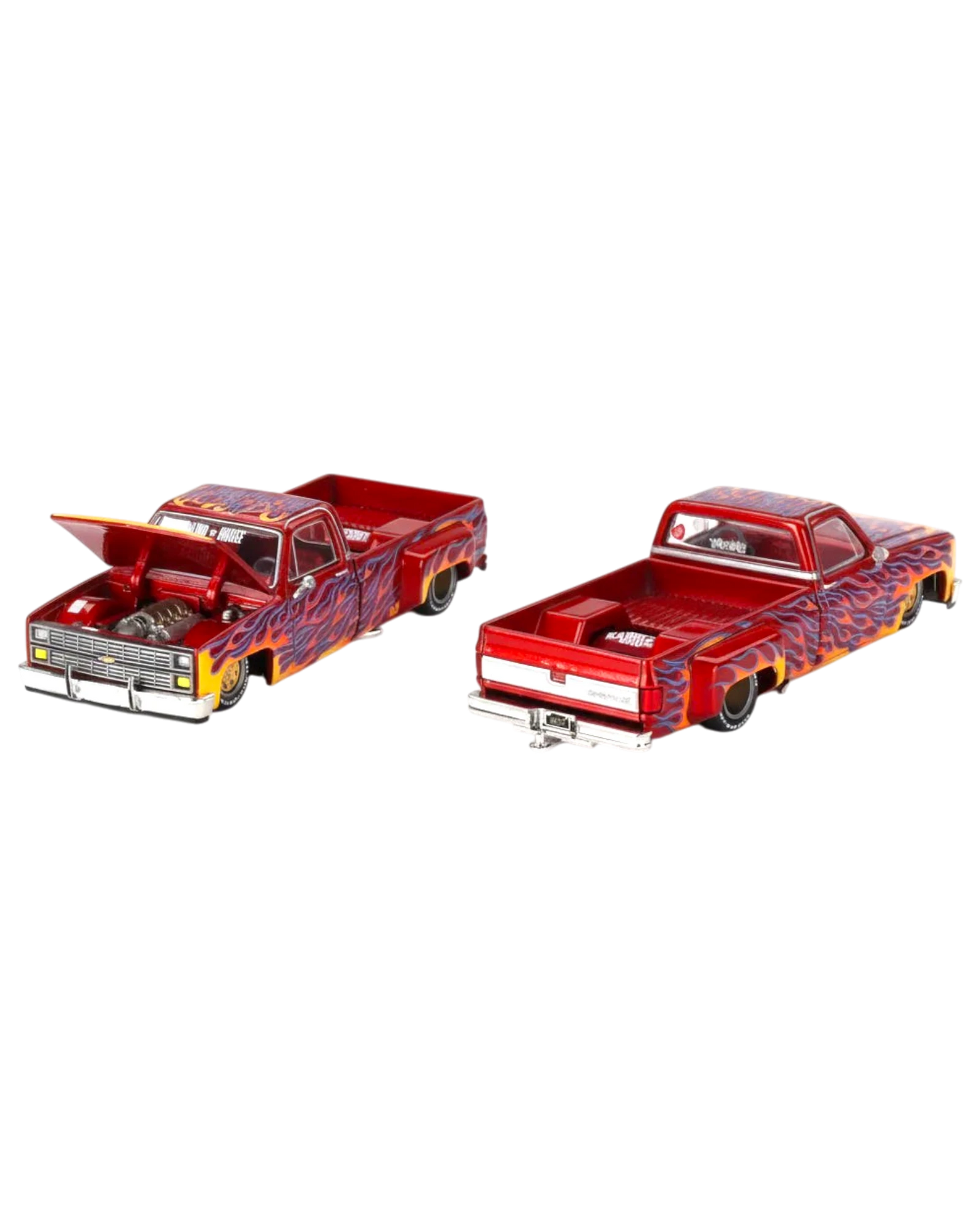 Two model trucks with flame design on a white background, featuring Kaido House Mini GT branding.