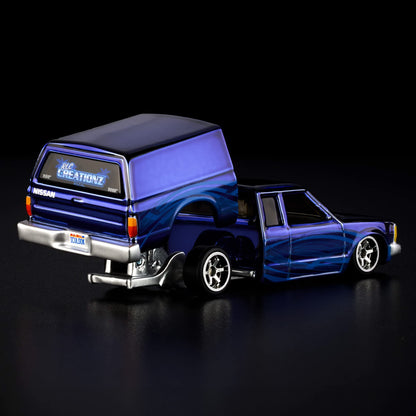 Hot Wheels RLC Exclusive 1986 Nissan 720 King Cab Spectraflame Steel Blue 1:64 Die-Cast JJY64-9893