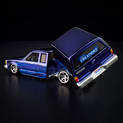 Hot Wheels RLC Exclusive 1986 Nissan 720 King Cab Spectraflame Steel Blue 1:64 Die-Cast JJY64-9893