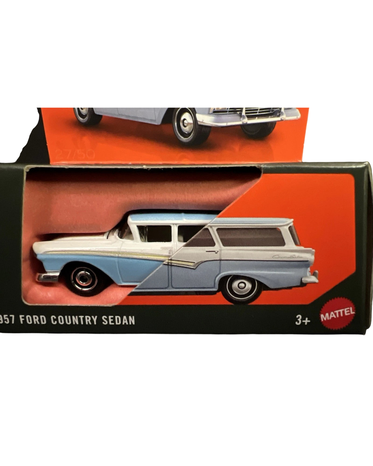More Than Diecast 1957 Ford Country Sedan die-cast car in blue and white, featuring moving parts in original packaging.