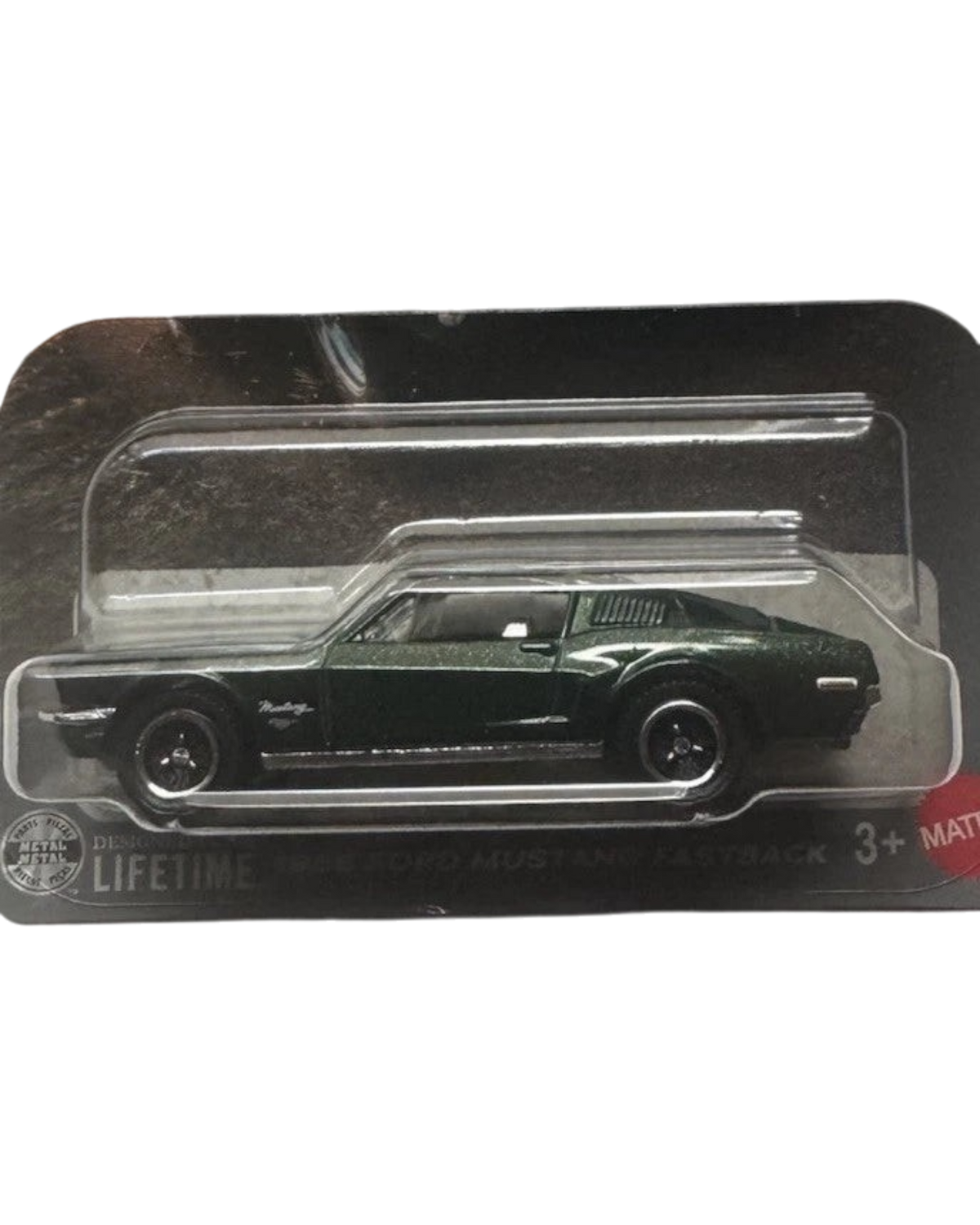 More Than Diecast 1:64 scale dark green 1968 Ford Mustang Fastback die-cast car in Matchbox The Movie packaging