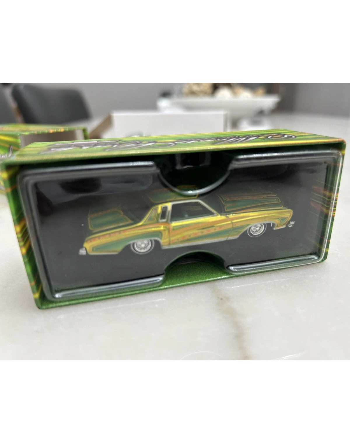 More Than Diecast Hot Wheels 1975 Chevrolet Monte Carlo RLC Exclusive lowrider in green and gold in display box
