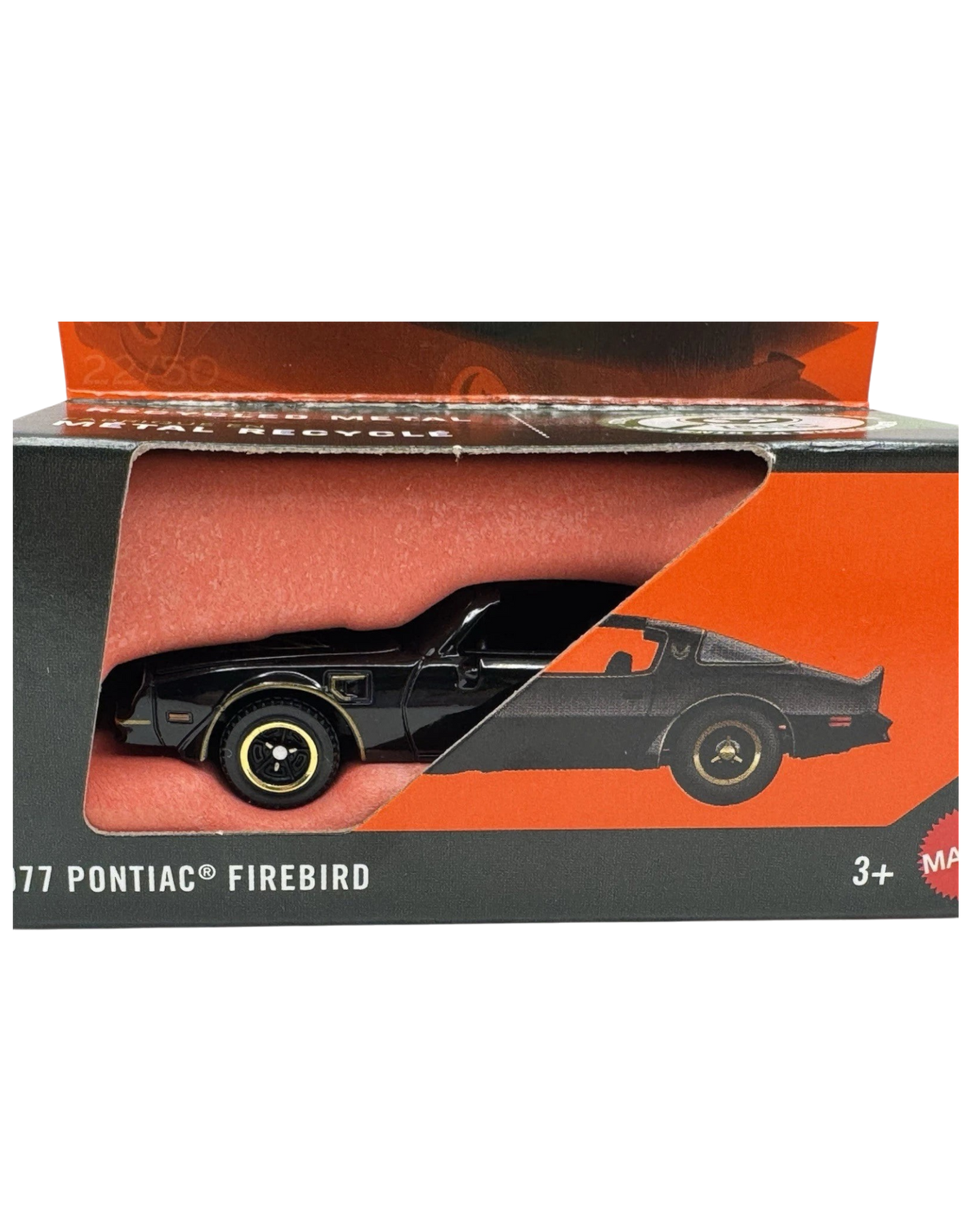 More Than Diecast Matchbox 1977 Pontiac Firebird black die-cast car in original orange and black packaging