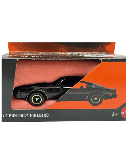 More Than Diecast Matchbox 1977 Pontiac Firebird black die-cast car in original orange and black packaging