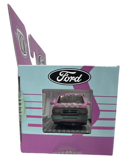 More Than Diecast 1:64 scale 1995 Ford Ranger in pink and blue two-tone livery inside its collectible display box