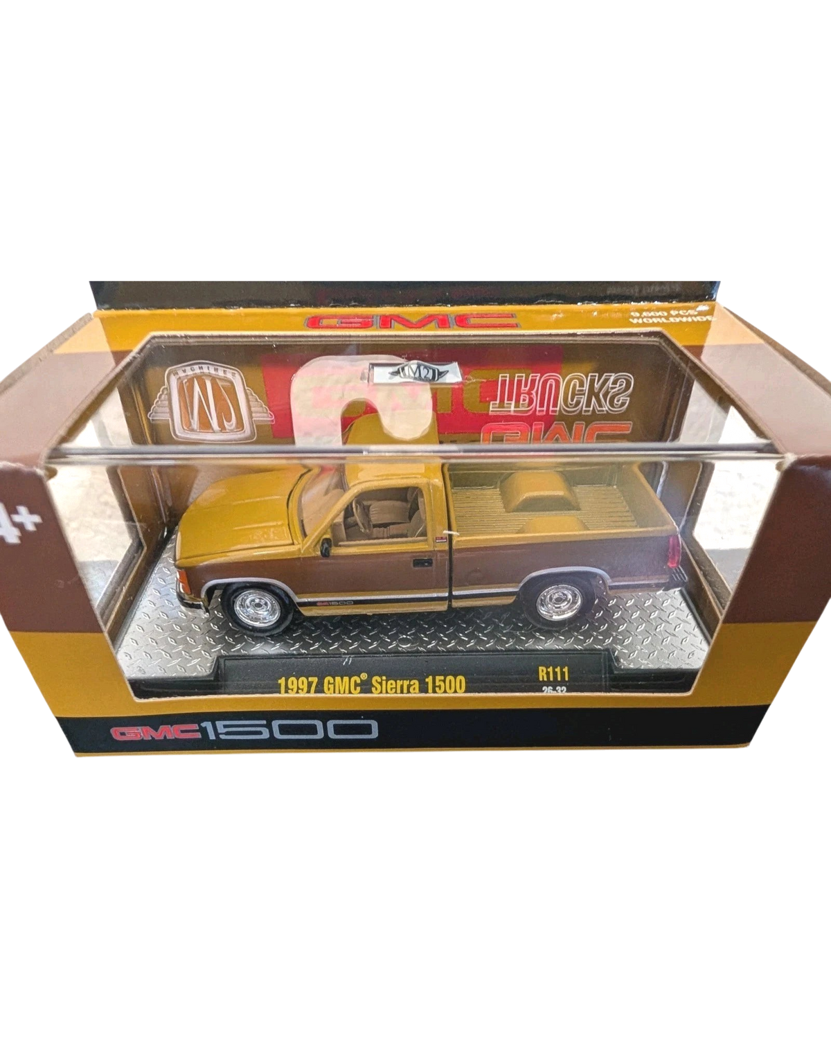 More Than Diecast M2 Machines 1:64 scale 1997 GMC Sierra 1500 truck in a two-tone brown and tan finish in packaging.