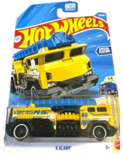 More Than Diecast Hot Wheels 5 Alarm fire truck toy in yellow and blue, HW Heavyweights series in original packaging.