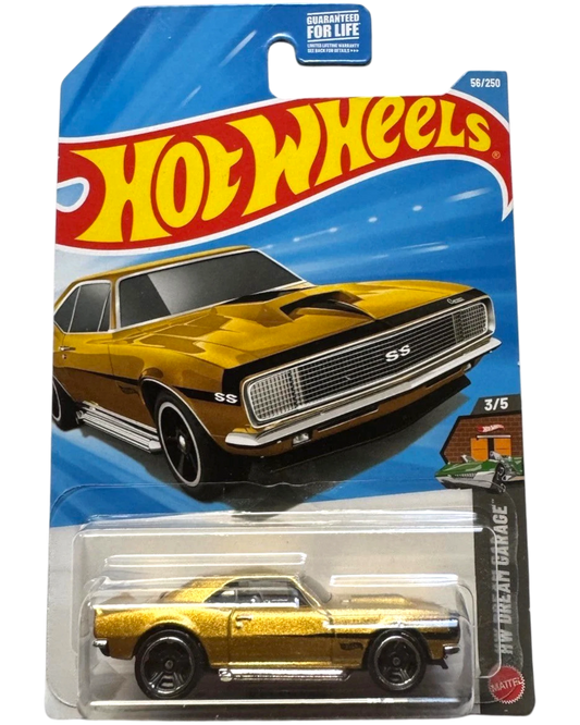 More Than Diecast 2026 Hot Wheels '67 Camaro SS diecast car in metallic gold with black accents and racing stripes.