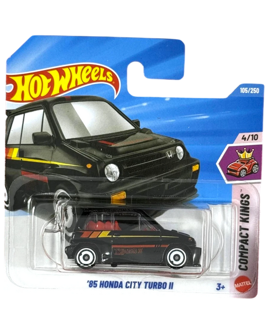 More Than Diecast 85 Honda City Turbo II Hot Wheels diecast car, black with yellow and red racing stripes.