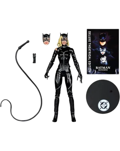 More Than Diecast Batman Returns battle damaged Catwoman action figure with whip, alternate head, and display base.
