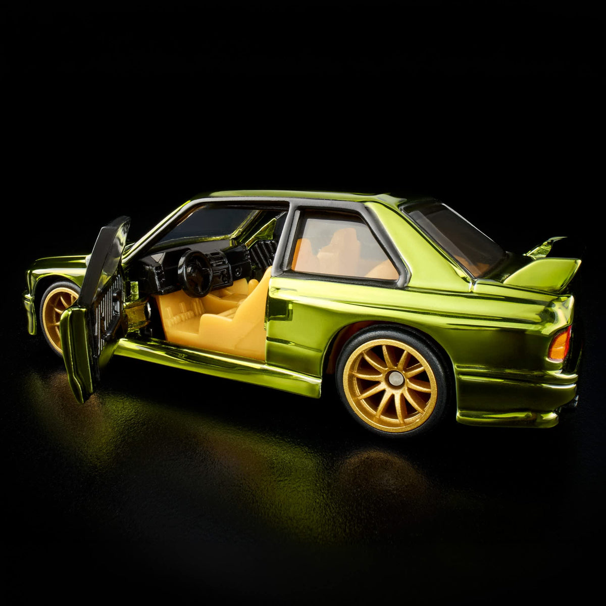 More Than Diecast 1:64 scale Hot Wheels 1991 BMW M3 in Spectraflame olive with opening doors and gold 10-spoke wheels.