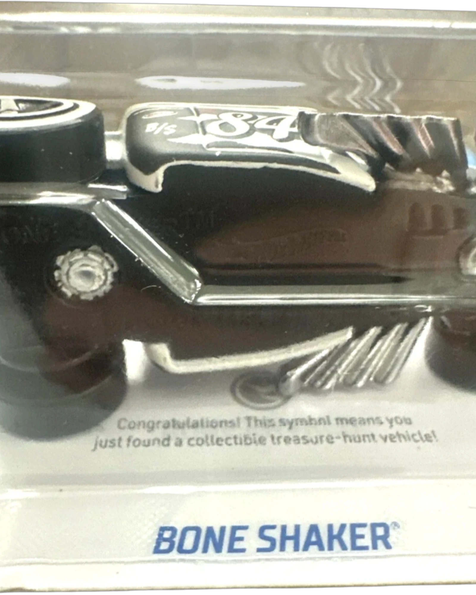 More Than Diecast Hot Wheels Bone Shaker Treasure Hunt die-cast car in original packaging with skull design