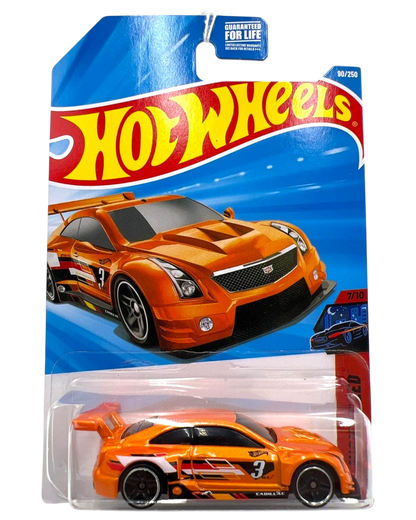 More Than Diecast 2026 Hot Wheels 16 Cadillac ATS-V R in orange with racing decals in original blister packaging.