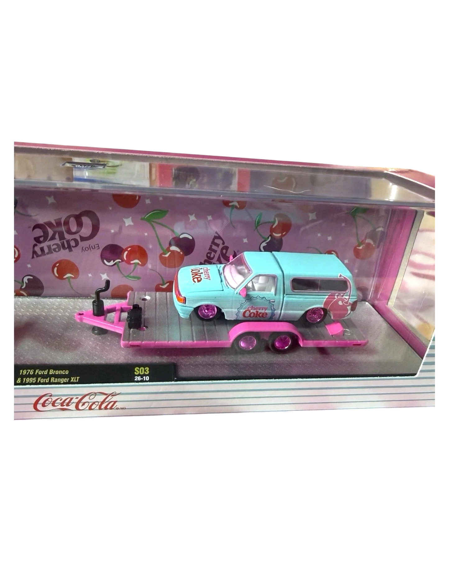 More Than Diecast M2 Machines 1:64 scale 1995 Ford Ranger XLT in pink and blue Cherry Coke livery on a trailer