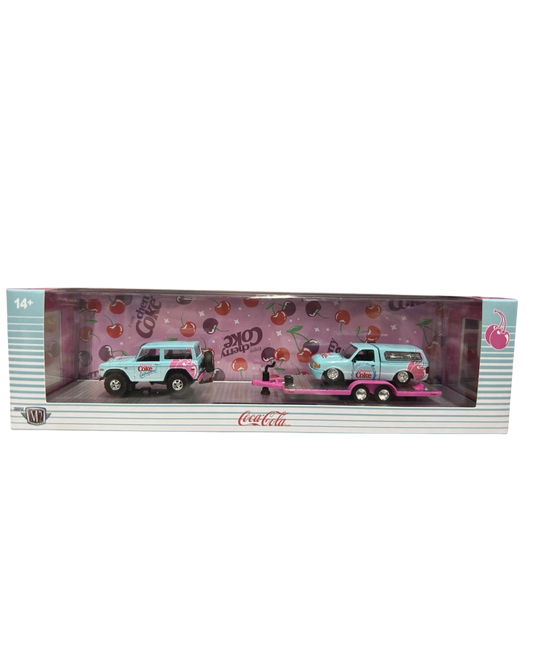 More Than Diecast M2 Machines Cherry Coke hauler set featuring a 1976 Ford Bronco and 1995 Ford Ranger XLT in light blue.