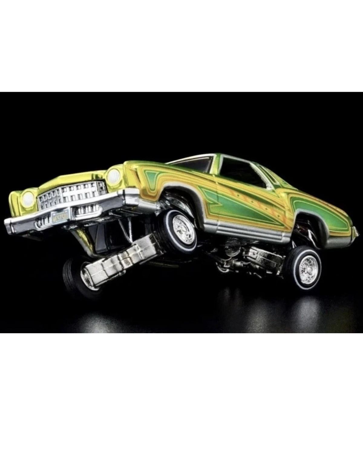 More Than Diecast Hot Wheels 1975 Chevrolet Monte Carlo lowrider in metallic green with custom pinstripe detailing