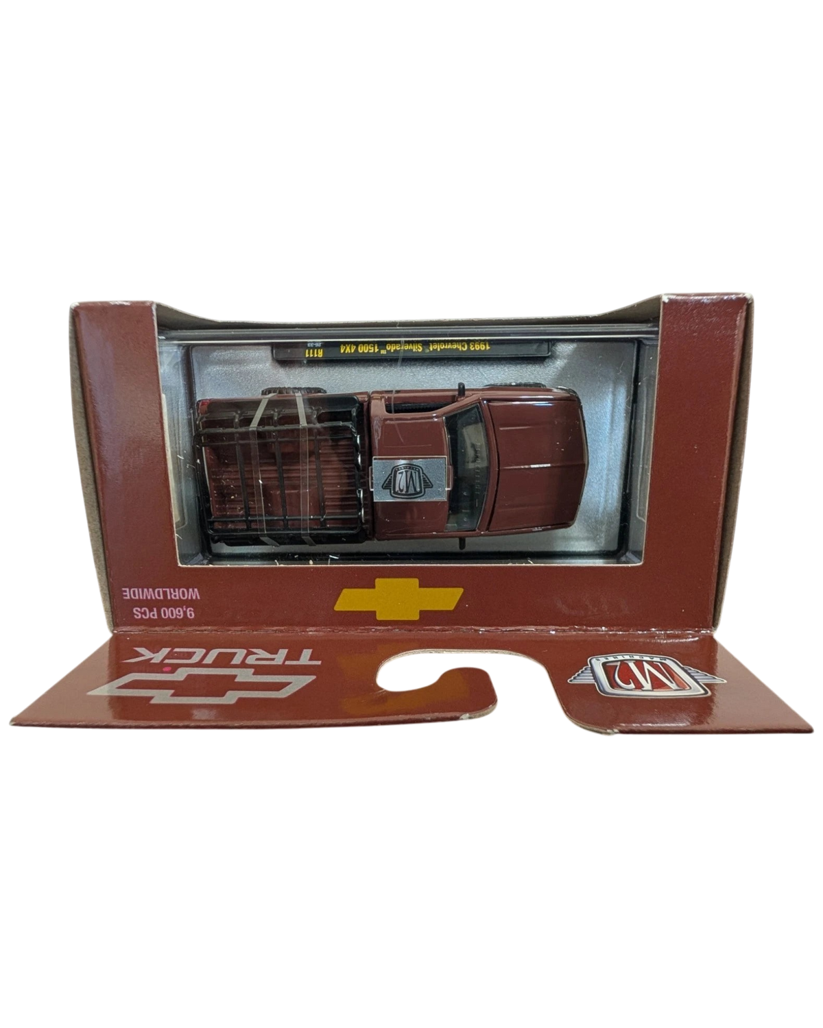 More Than Diecast 1993 Chevrolet Silverado 1500 4x4 die-cast truck in brown, 1:64 scale, inside original packaging.