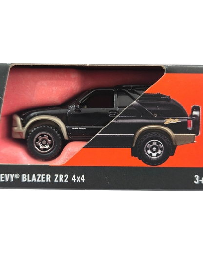 More Than Diecast 1:64 scale black 2002 Chevy Blazer ZR2 4x4 die-cast SUV in original Matchbox Moving Parts packaging