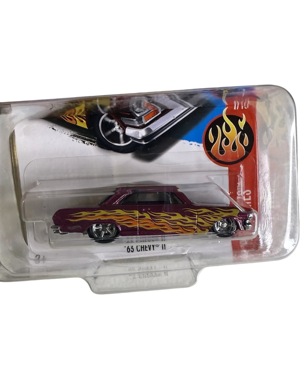 More Than Diecast Hot Wheels 63 Chevy II Super Treasure Hunt in pink Spectraflame paint with yellow flame graphics