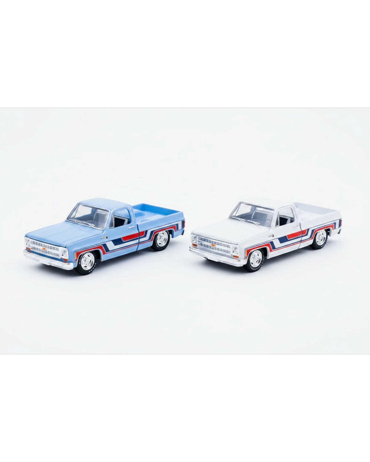 More Than Diecast M2 Machines 1976 Chevy Silverado Spirit of 76 truck set in blue and white with patriotic graphics.