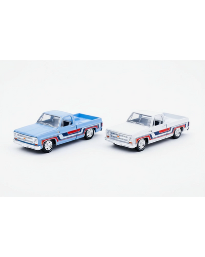More Than Diecast M2 Machines 1976 Chevy Silverado Spirit of 76 truck set in blue and white with patriotic graphics.
