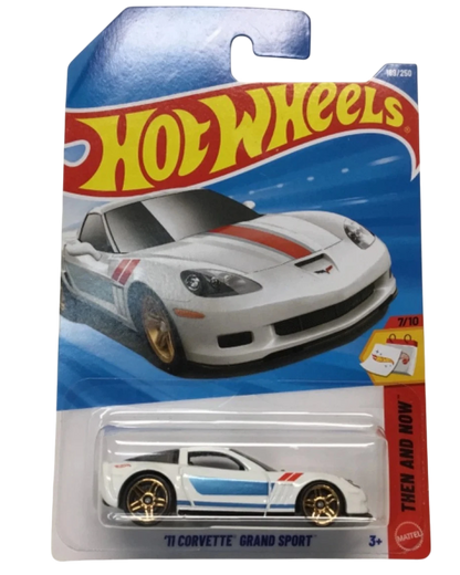 More Than Diecast Hot Wheels 2011 Corvette Grand Sport white diecast car with red and blue stripes in original packaging