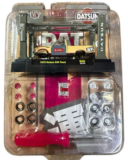 More Than Diecast M2 Machines 1974 Datsun 620 pickup truck model kit with extra wheels and tools in blister packaging
