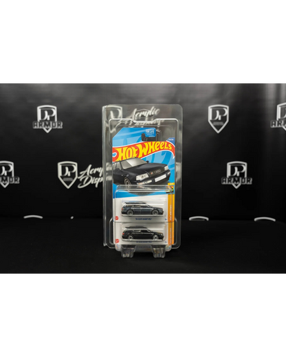 More Than Diecast Diamond dual-card protector holding two Hot Wheels Audi Avant RS2 diecast cars in clear PVC case.