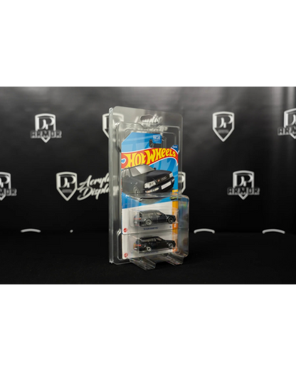 More Than Diecast Diamond dual-card protector holding two Hot Wheels Audi Avant RS2 cars in clear protective casing