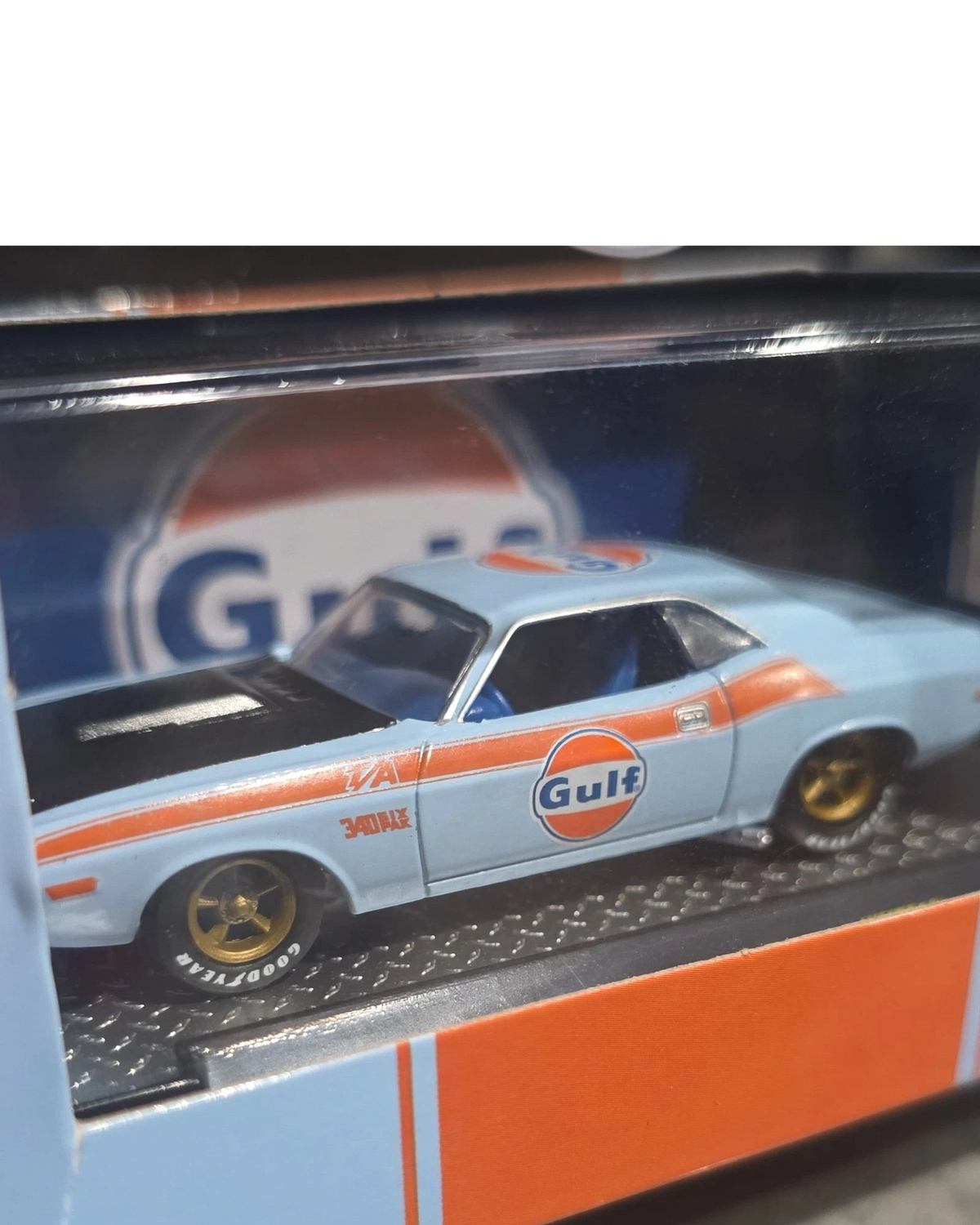 More Than Diecast 1:64 scale 1970 Dodge Challenger T/A in Gulf Oil light blue and orange livery with gold wheels