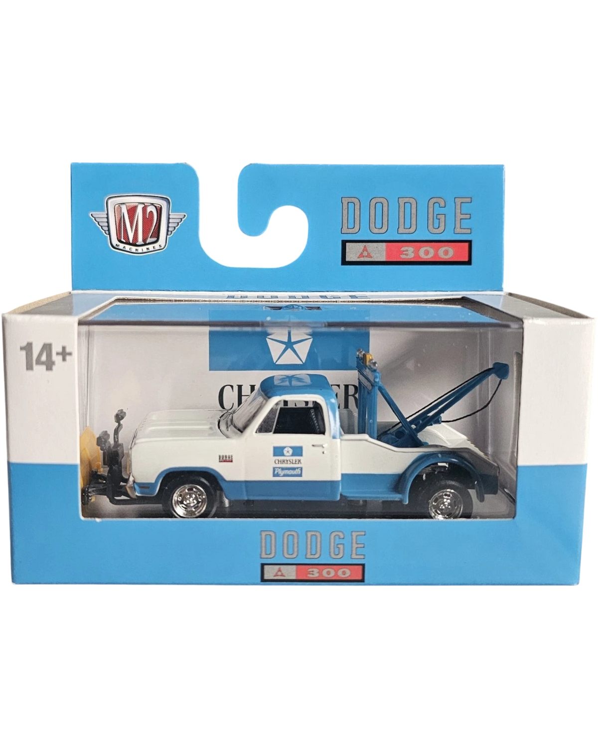 More Than Diecast 1:64 scale 1972 Dodge D-300 tow truck in white and blue, packaged in a branded display box.