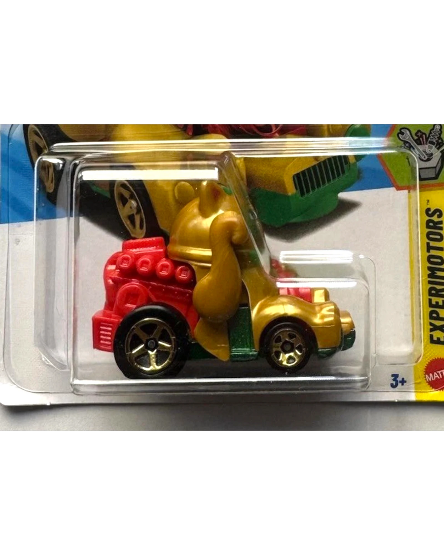More Than Diecast Feline Lucky Hot Wheels EXPERIMOTORS toy car, gold with red engine and green accents.