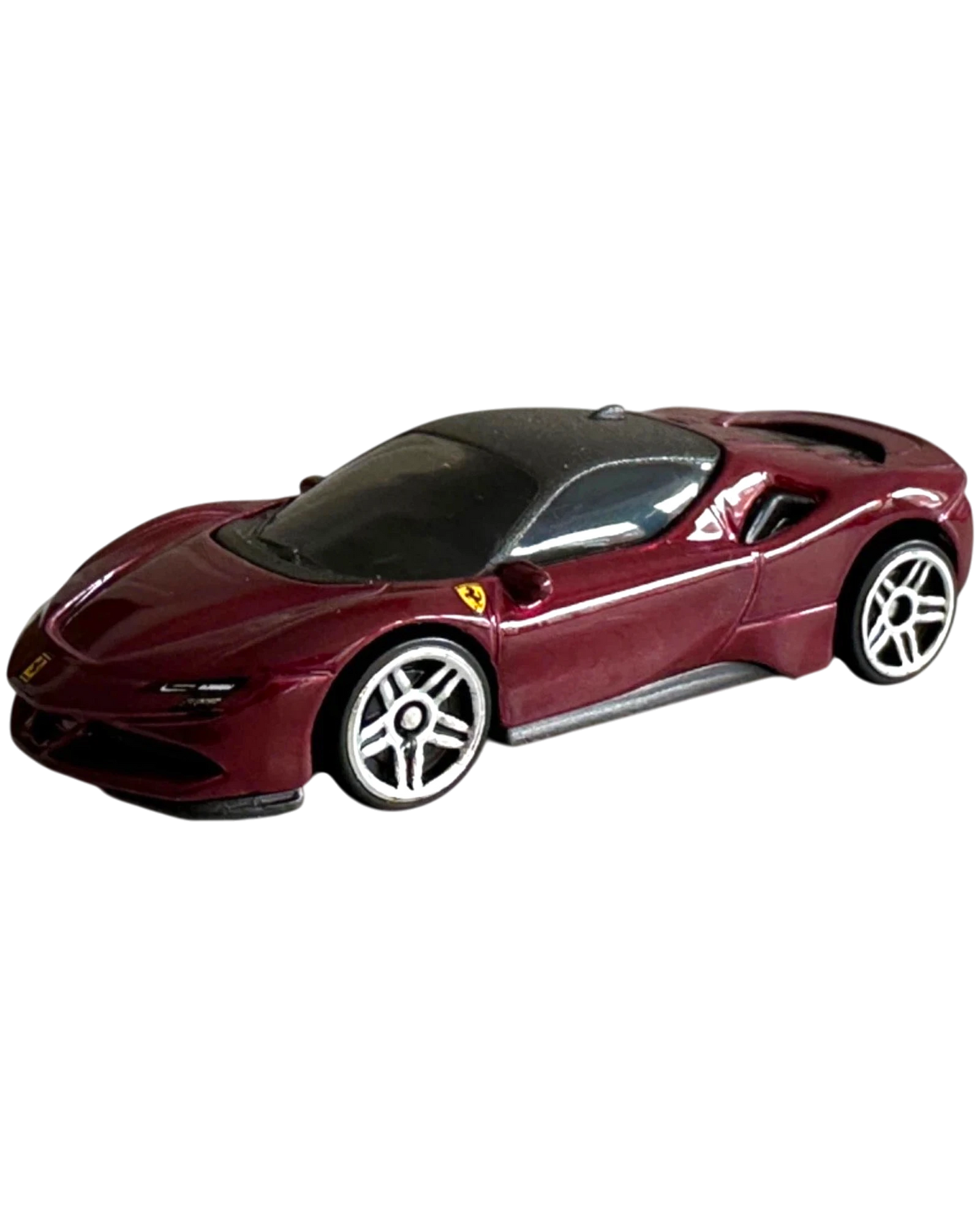 More Than Diecast Hot Wheels Ferrari SF90 Stradale 1:64 scale die-cast car in deep metallic red with silver wheels.