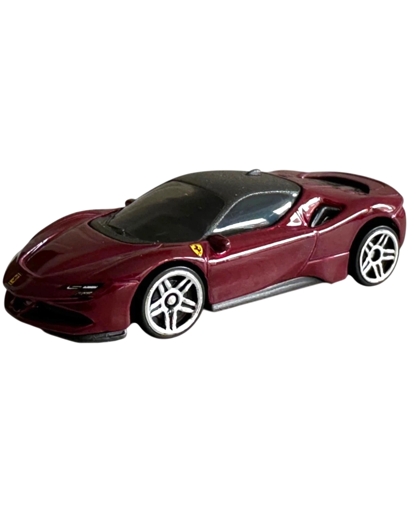 More Than Diecast Hot Wheels Ferrari SF90 Stradale 1:64 scale die-cast car in deep metallic red with silver wheels.