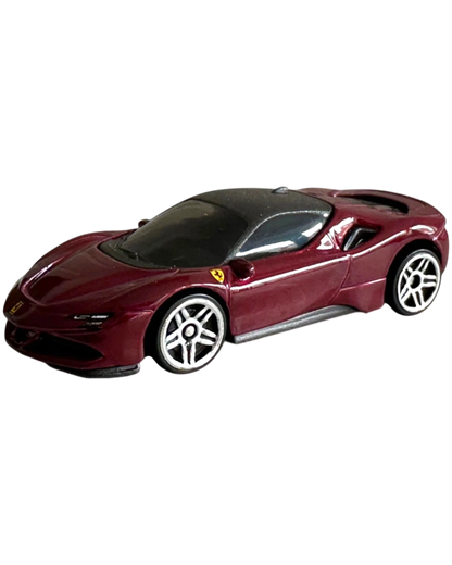 More Than Diecast Hot Wheels Ferrari SF90 Stradale 1:64 scale die-cast car in deep metallic red with silver wheels.