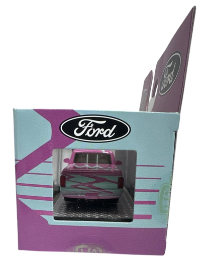 More Than Diecast 1:64 scale 1995 Ford Ranger die-cast truck in pink and blue two-tone livery inside packaging