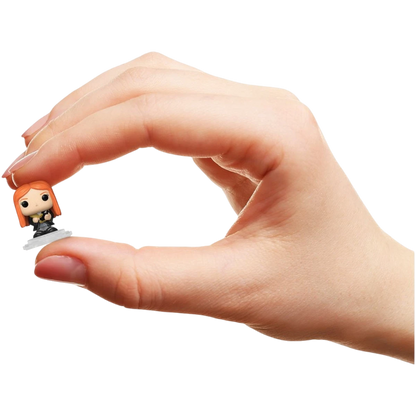 More Than Diecast Funko Bitty Pop! Ginny Weasley mini-figure held between fingers to show its small 1-inch scale.