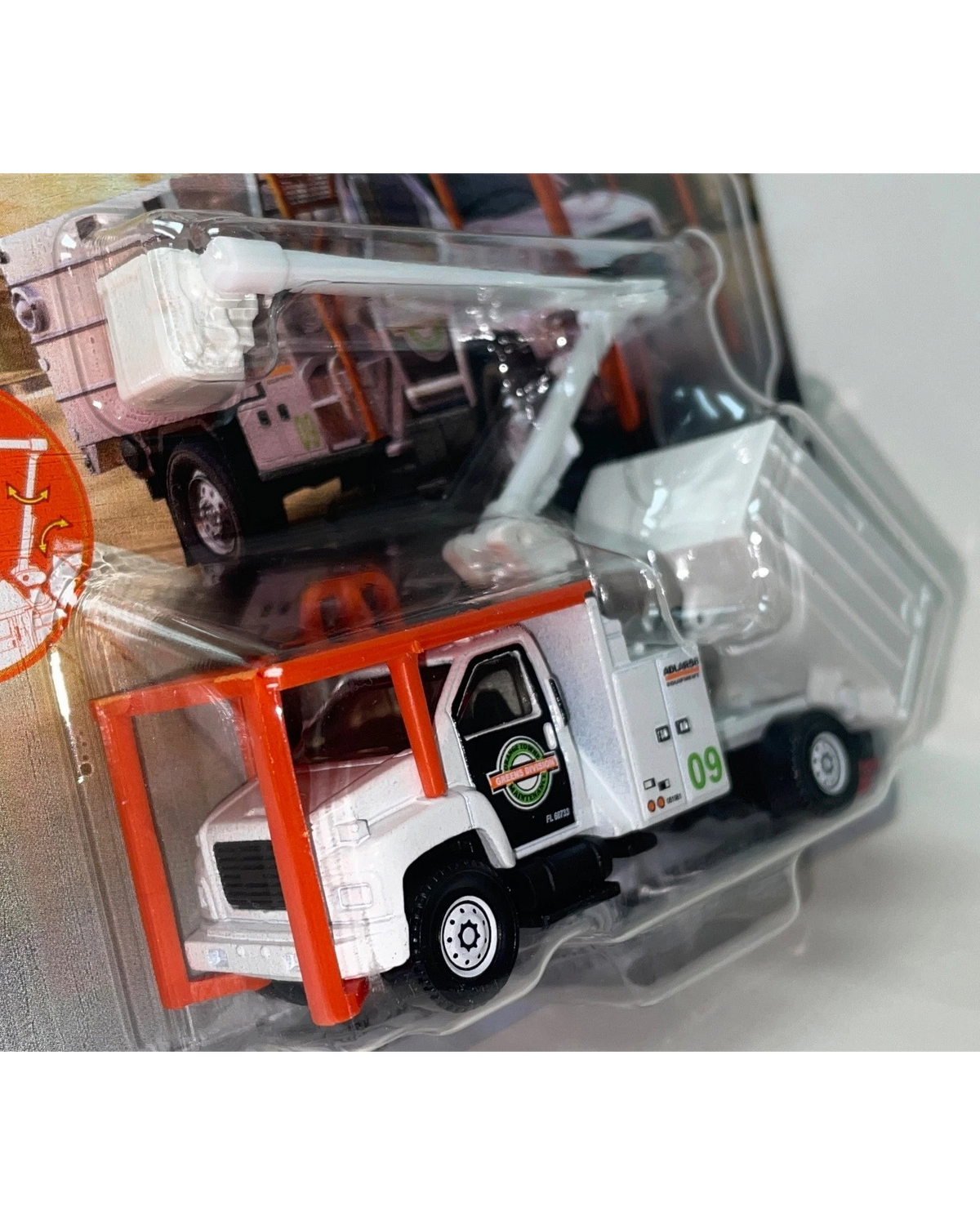 More Than Diecast Matchbox GMC C8500 Topkick tree trimming truck in 1:64 scale with white and orange detailing.