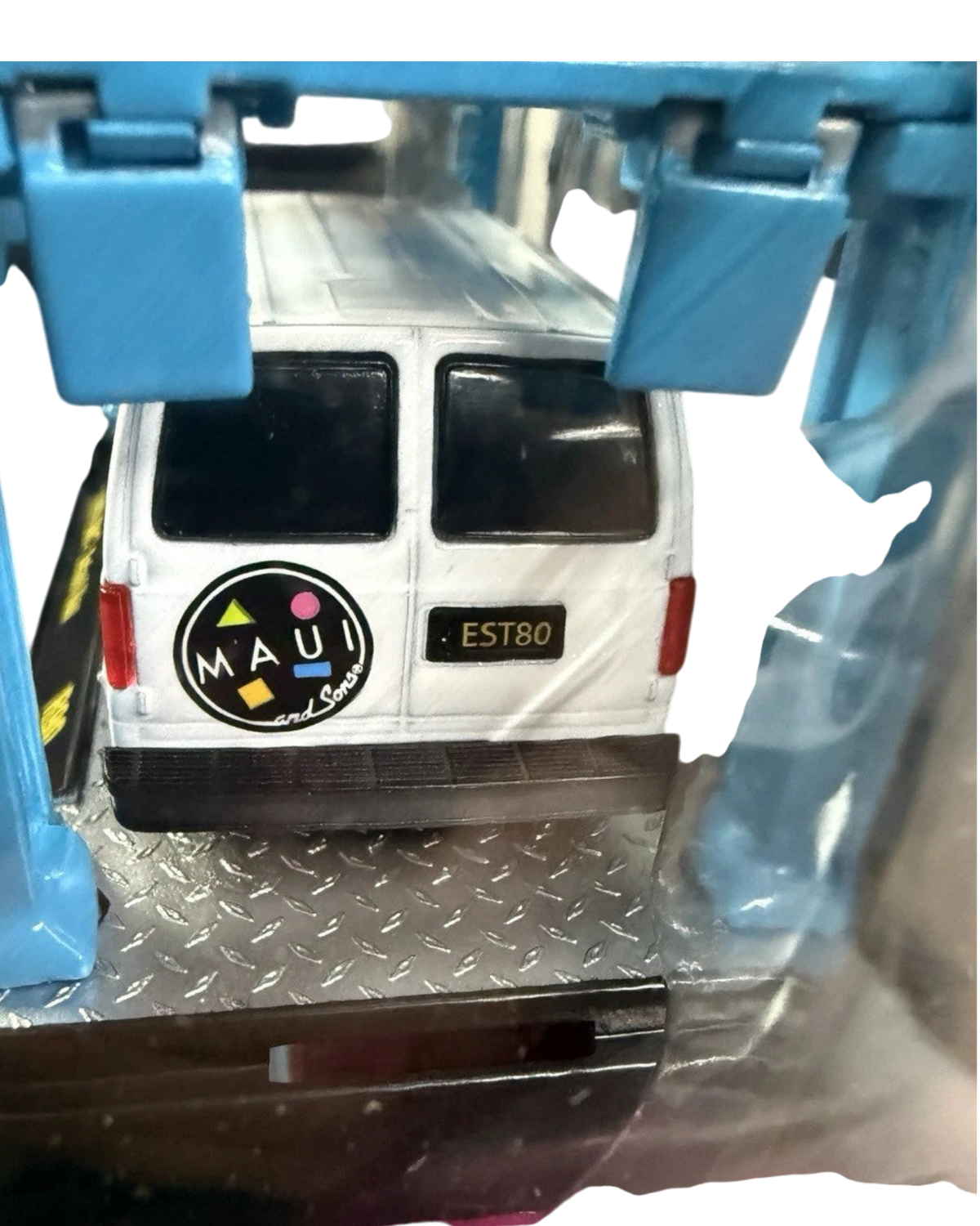 More Than Diecast 1:64 scale white 1995 GMC Safari van model with Maui and Sons rear branding in packaging