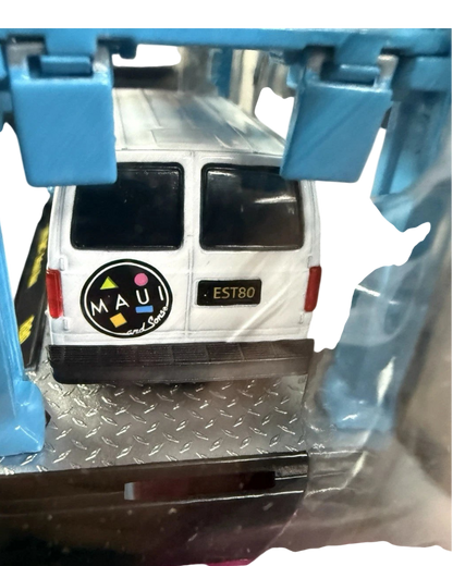 More Than Diecast 1:64 scale white 1995 GMC Safari van model with Maui and Sons rear branding in packaging