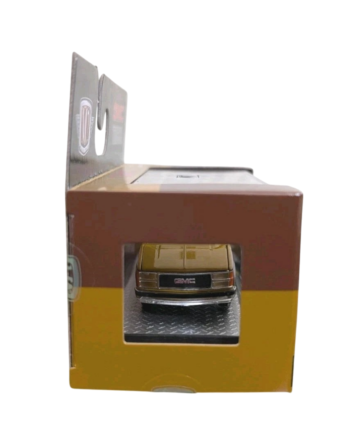More Than Diecast 1:64 scale 1997 GMC Sierra 1500 die-cast truck in two-tone brown and tan inside its display box