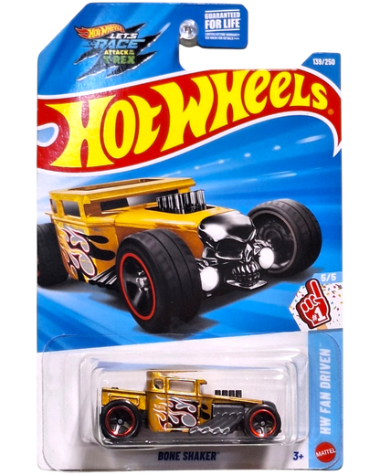 More Than Diecast 2026 Hot Wheels Bone Shaker gold die-cast car with skull grille and flame graphics in blister pack