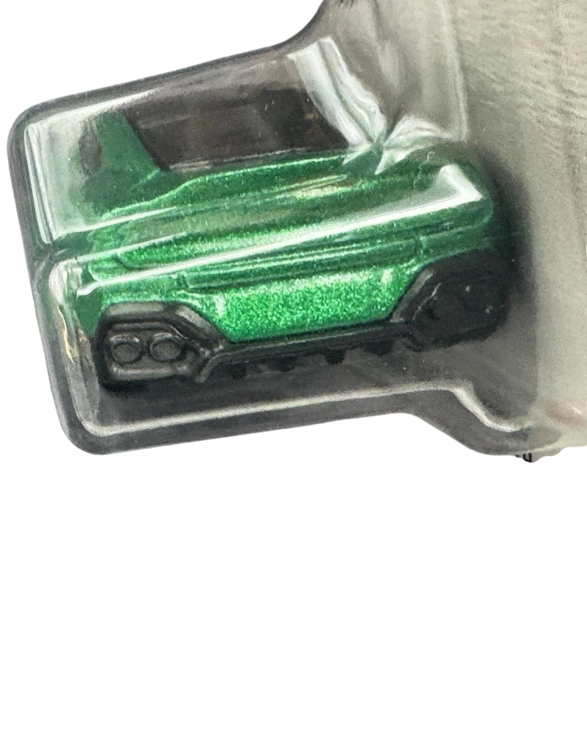 More Than Diecast 2025 Aston Martin Vanquish toy car in metallic green, rear view showing exhaust and taillights