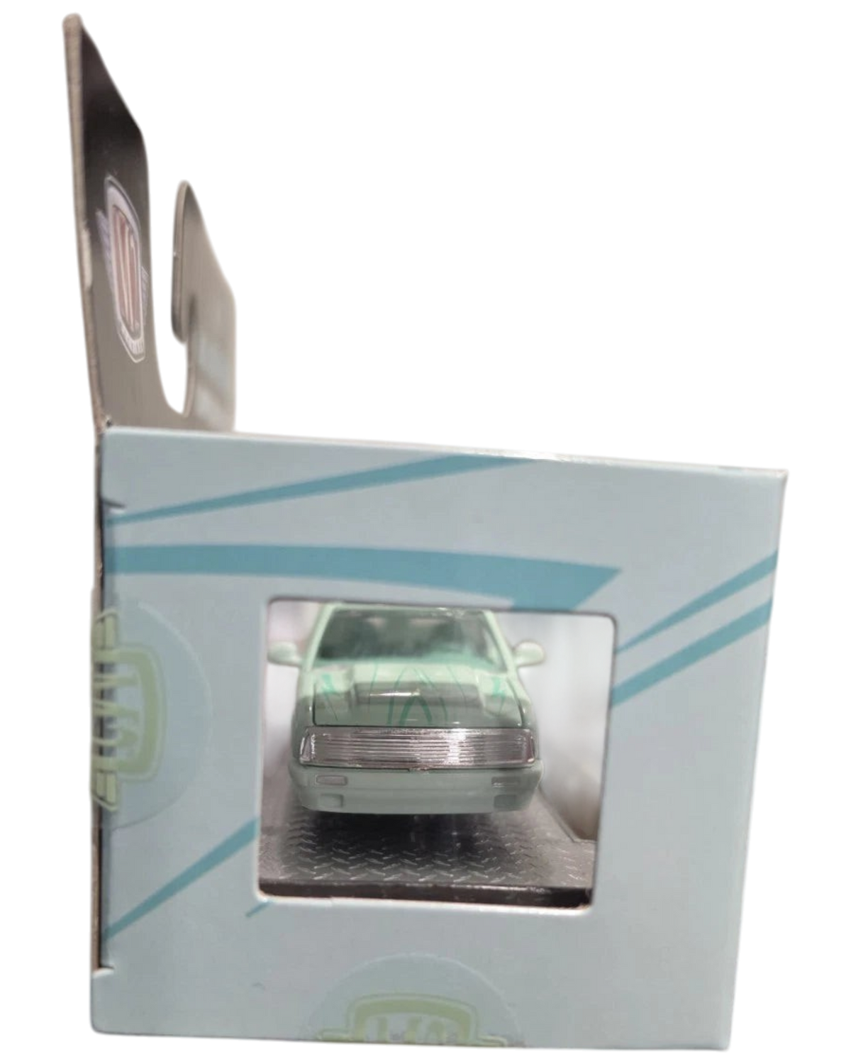 More Than Diecast 1:64 scale 1995 Chevrolet S10 lowrider in green, viewed through the front of its display box.